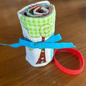 Handcrafted Crayon Cozy with blue tie and 16 crayons included